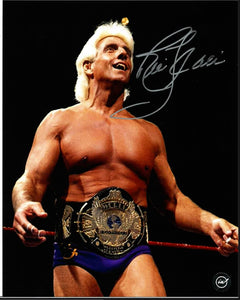 Ric Flair Wearing a Championship Belt WWF Autographed 8x10