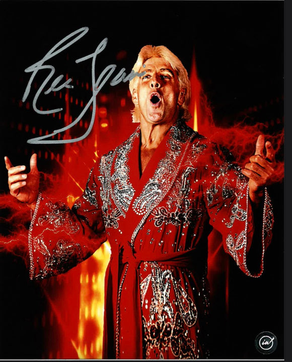 Ric Flair Wearing a Robe WWF Autographed 8x10